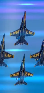 Blue Angels jets performing aerobatics against a blue sky.