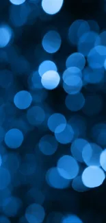 Blue bokeh pattern mobile wallpaper with blurred lights.