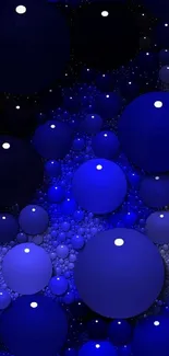 Abstract wallpaper with blue bubbles and dark background.