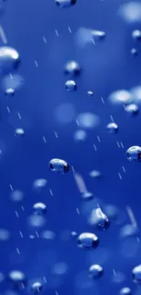 Blue abstract wallpaper with floating bubbles.