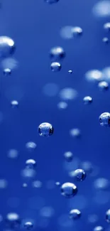 Abstract blue bubbles wallpaper with a modern, reflective design.