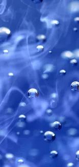 Blue bubbles floating on a dark blue background wallpaper.