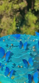 Vibrant blue cake with butterfly decorations on a green background.