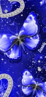 Blue butterflies and sparkling hearts wallpaper on a dark blue background.