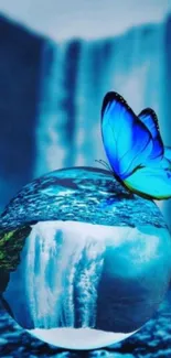 Blue butterfly on crystal ball with waterfall backdrop.