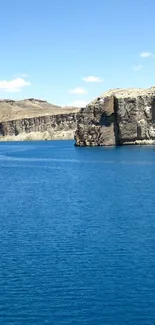 Tranquil blue canyon and water mobile wallpaper.