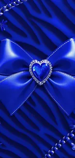 Royal blue wallpaper with jewel heart and bow.