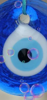 Blue eye charm with colorful bubbles wallpaper.