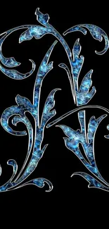 Elegant blue floral letter on black background wallpaper.