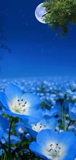 Blue flowers under a starry night sky with a glowing moon.