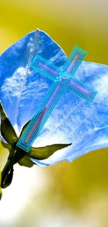 Serene blue flower with glass cross on vibrant green background.