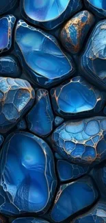 Blue gemstones with intricate patterns in abstract art design.