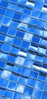 Blue geometric tile pattern with reflective surfaces.