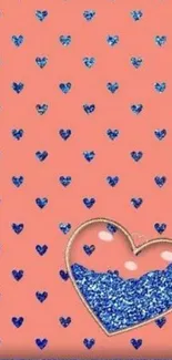 Coral pink wallpaper with blue glitter hearts and a heart design.