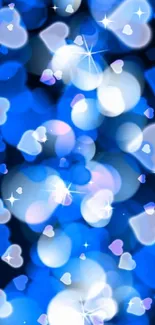 Vibrant blue heart bokeh wallpaper with glowing light effects.