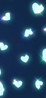 Glowing blue hearts on a dark background wallpaper.