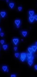 Vibrant blue heart glow wallpaper on a dark background.