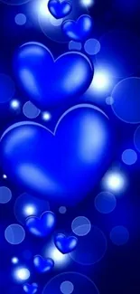 Vibrant blue hearts with glowing effect on a dark background.