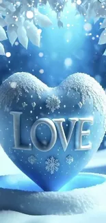 Blue heart in snowy landscape with "Love" text in wintry setting.