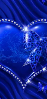 Blue heart with sparkling bow and butterfly accents.