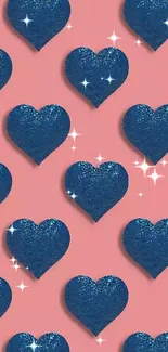 Blue glitter hearts on a pink background wallpaper.