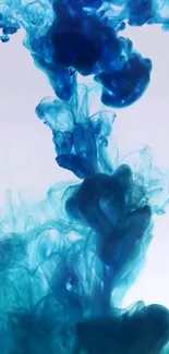 Blue ink flowing dynamically in water, creating an abstract visual effect.