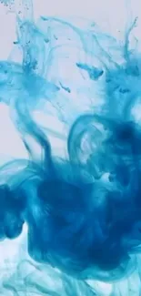 Blue ink swirl creating an abstract, fluid art design.