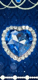 Blue jewel heart with pearls on elegant wallpaper background.