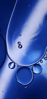 Abstract design of blue liquid bubbles creates a captivating phone wallpaper.