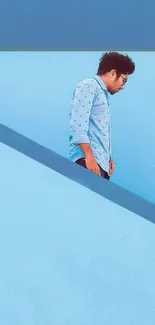 Minimalist blue wallpaper with a person for mobile phone.