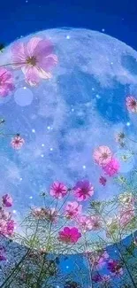 Blue moon with pink flowers in night sky.