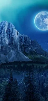 Majestic mountain with blue moonlit sky and forest in the foreground.