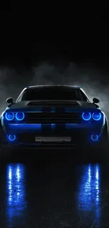 Muscle car glowing with blue neon lights in the dark night.