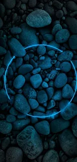 Blue neon circle on dark stone pebbles wallpaper.