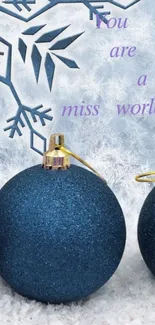 Blue ornaments with snowflakes on a winter background.