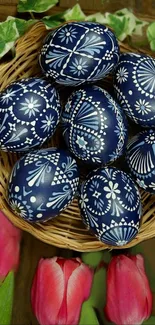 Blue Easter eggs in basket with tulips.