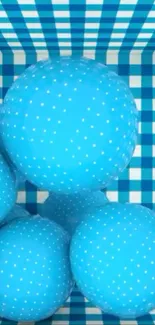 Blue polka dot spheres with checkered background.