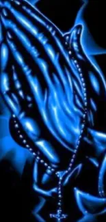 Blue glowing praying hands with rosary wallpaper.