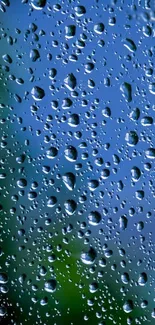 Blue and green raindrop wallpaper for mobile screens.