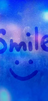 Vibrant blue wallpaper with a smiling face and texture.