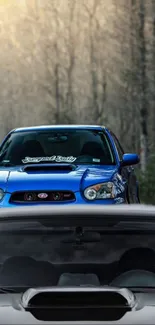 Two Subaru cars in a forest setting, emphasizing blue hues and dynamic design.