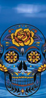 Blue sugar skull with floral designs on rippling water background.