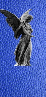 Cobalt blue textured wallpaper with angel statue.