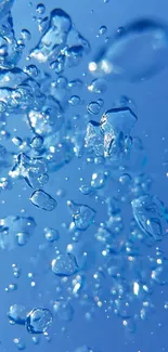 Crystal clear water with floating bubbles on a blue background.