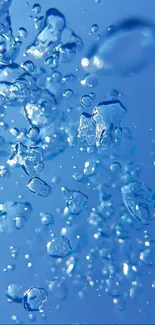 Blue water droplets creating vibrant mobile wallpaper design.