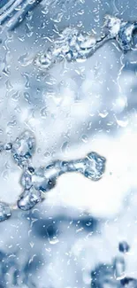 Close-up of water droplets against a light blue background.