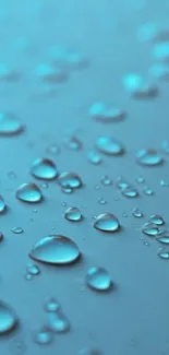 Blue water droplets on a smooth surface wallpaper.