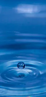 Blue water ripple with suspended droplet on mobile wallpaper.