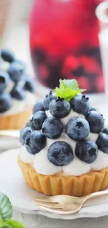 Blueberry tart with cream on a white plate, perfect for dessert lovers.