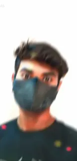 Blurred portrait of a person wearing a dark mask on a white background.